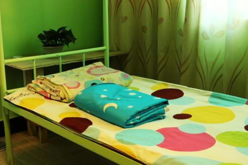 Imagen de la habitación del Hostel Blue Sky, fenghuang. Foto 6