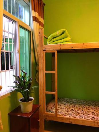 Imagen de la habitación del Hostel Blue Sky, fenghuang. Foto 7