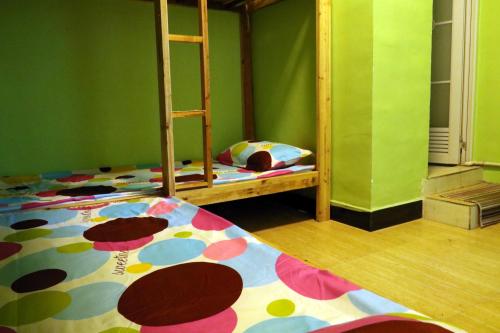 Imagen de la habitación del Hostel Blue Sky, fenghuang. Foto 8