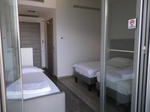 Imagen de la habitación del Hostel Campione Univela. Foto 6