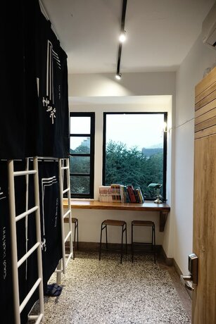Imagen de la habitación del Hostel Caoji Book Inn. Foto 19