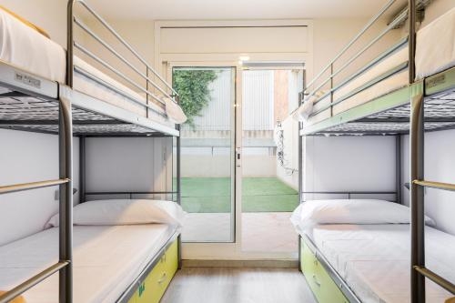 Imagen de la habitación del Hostel Casa Barcelo Camp Nou Barcelona. Foto 5