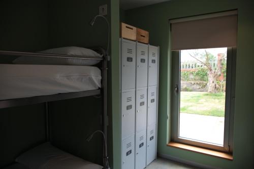 Imagen de la habitación del Hostel Casa Carmina. Foto 14
