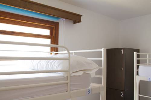 Imagen de la habitación del Hostel Casa Grande Surf. Foto 4