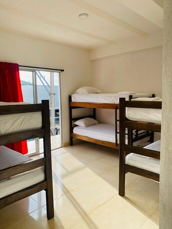 Imagen de la habitación del Hostel Casa Guiwa. Foto 20