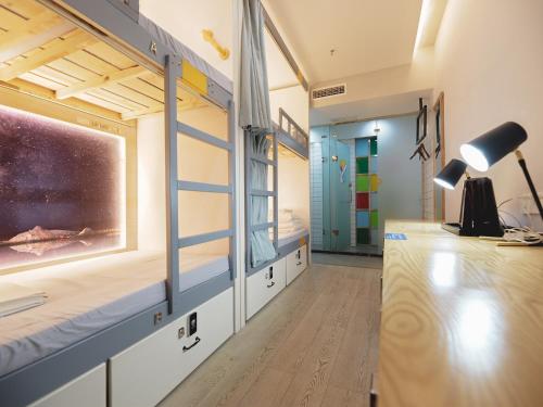 Imagen de la habitación del Hostel Chengdu Chasing Dream Chunxi Road Branch. Foto 5