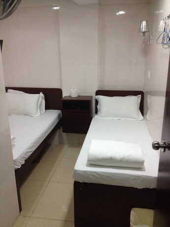 Imagen de la habitación del Hostel China Guest. Foto 12