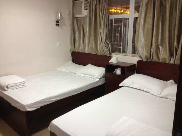Imagen de la habitación del Hostel China Guest. Foto 15