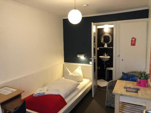 Imagen de la habitación del Hostel City, Wilhelmshaven. Foto 9
