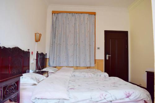 Imagen de la habitación del Hostel Dali Spring Field. Foto 6