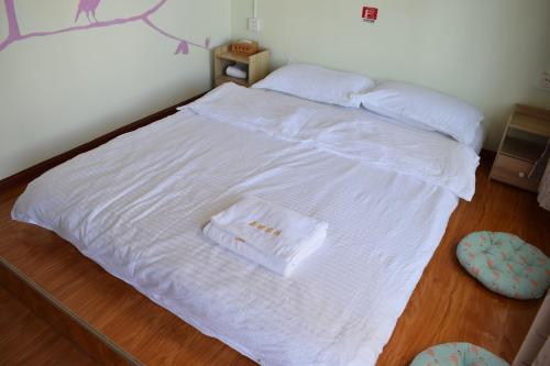 Imagen de la habitación del Hostel Dali Spring Field. Foto 9
