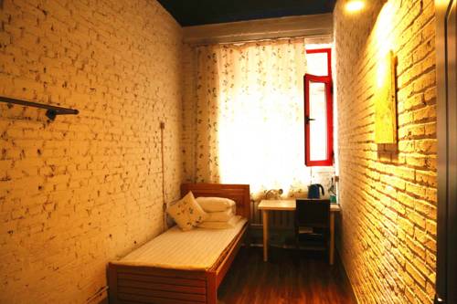 Imagen de la habitación del Hostel Dalian Tiantian International Youth. Foto 6