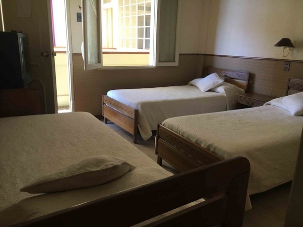 Imagen de la habitación del Hostel Del Puerto. Foto 8