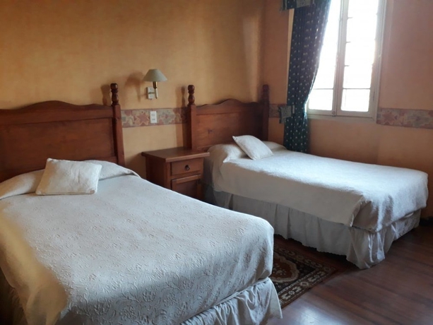 Imagen de la habitación del Hostel Del Puerto. Foto 9