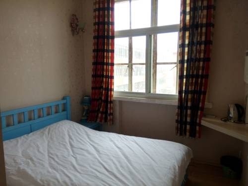 Imagen de la habitación del Hostel Dunhuang International Youth. Foto 2