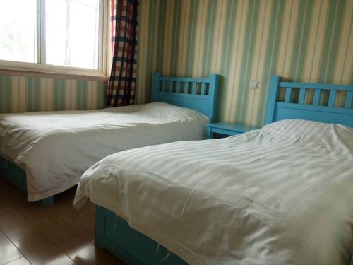 Imagen de la habitación del Hostel Dunhuang International Youth. Foto 3