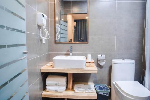 Imagen de la habitación del Hostel Emei Haiyun Youth. Foto 7