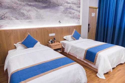 Imagen de la habitación del Hostel Emei Haiyun Youth. Foto 8