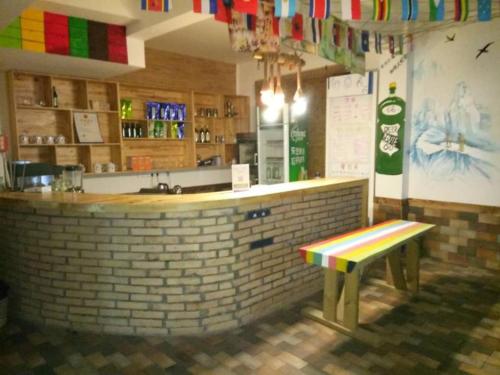 Imagen de la habitación del Hostel En Shi Wen Dao Youth. Foto 10