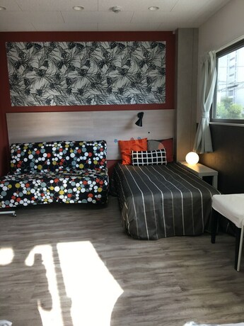 Imagen de la habitación del Hostel Familia, Osaka. Foto 27