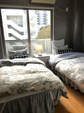 Imagen de la habitación del Hostel Familia, Osaka. Foto 29