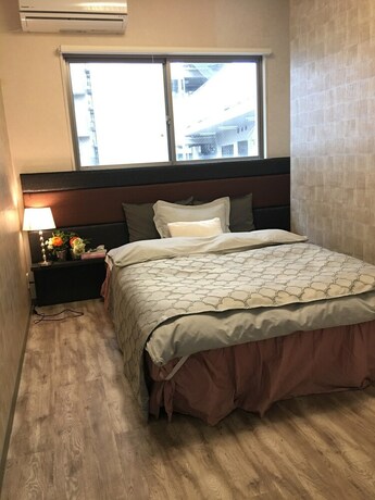 Imagen de la habitación del Hostel Familia, Osaka. Foto 32