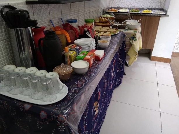 Imagen del bar/restaurante del Hostel Farol Da Barra Suites E. Foto 3