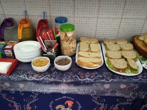 Imagen del bar/restaurante del Hostel Farol Da Barra Suites E. Foto 4