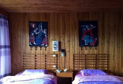 Imagen de la habitación del Hostel Fenghuang Border International Youth. Foto 3