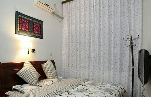 Imagen de la habitación del Hostel Fenghuang Border International Youth. Foto 4