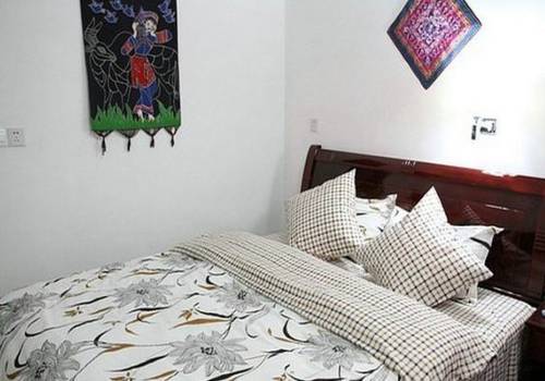 Imagen de la habitación del Hostel Fenghuang Border International Youth. Foto 5