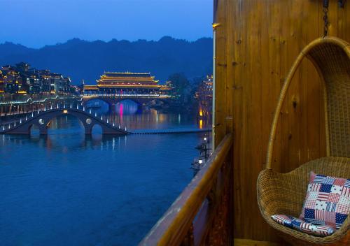 Imagen de la habitación del Hostel Fenghuang Joy Riverview. Foto 6