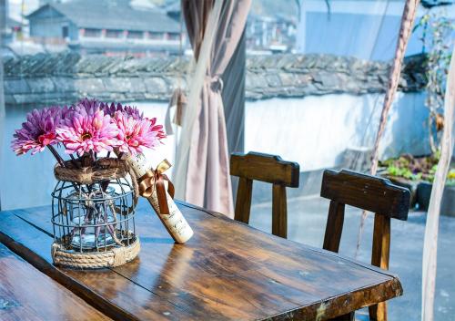 Imagen de la habitación del Hostel Fenghuang Joy Riverview. Foto 7