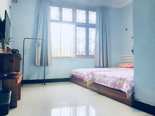 Imagen general del Hostel Fenghuang Relay Sunshine. Foto 4