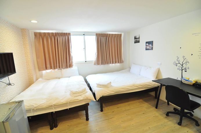 Imagen de los interiores del Hostel Fengjia Happy Play. Foto 12