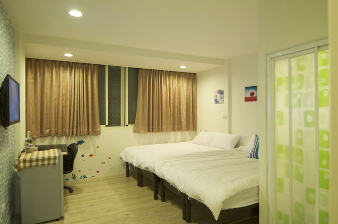 Imagen de la habitación del Hostel Fengjia Happy Play. Foto 11