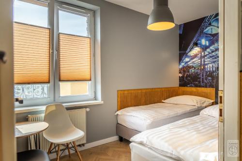 Imagen de la habitación del Hostel Flamingo Centrum. Foto 7