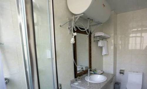 Imagen de la habitación del Hostel Gonggashan. Foto 2