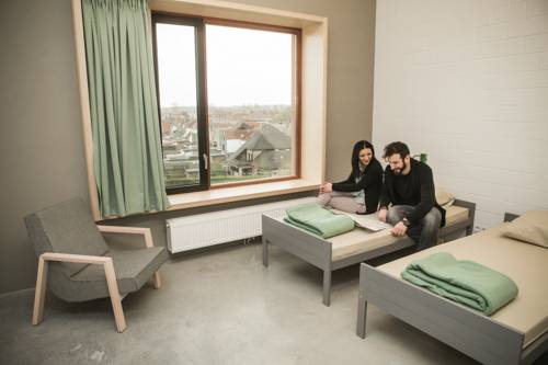 Imagen de la habitación del Hostel Groeninghe, Kortrijk. Foto 2