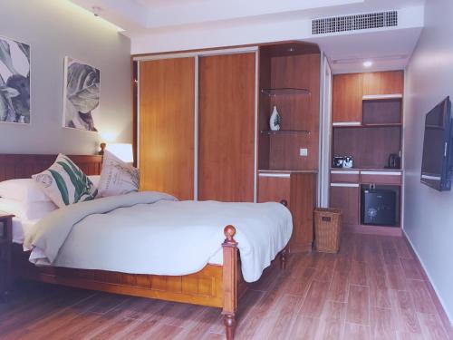 Imagen de la habitación del Hostel Hainan Happy Time Party. Foto 5