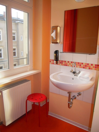 Imagen de la habitación del Hostel Happygolucky Hotel and. Foto 9