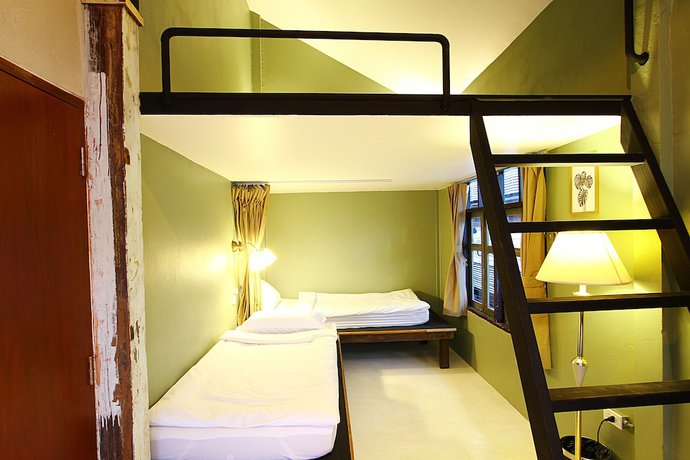 Imagen de la habitación del Hostel Here, Bangkok. Foto 16