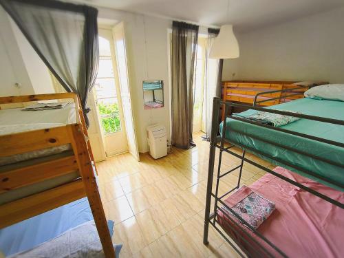 Imagen de la habitación del Hostel Historic Malaga Centro Rooms. Foto 12