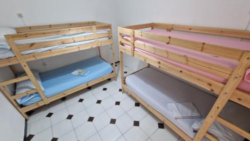Imagen de la habitación del Hostel Historic Malaga Centro Rooms. Foto 13