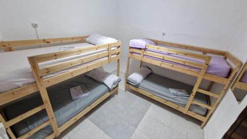 Imagen de la habitación del Hostel Historic Malaga Centro Rooms. Foto 16
