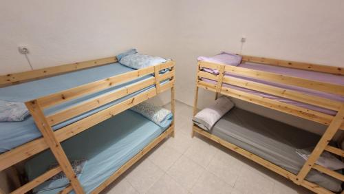 Imagen de la habitación del Hostel Historic Malaga Centro Rooms. Foto 17