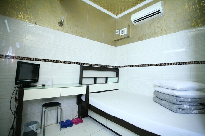 Imagen de la habitación del Hostel H.k Commercial Inn. Foto 3