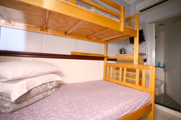 Imagen de la habitación del Hostel H.k Commercial Inn. Foto 5