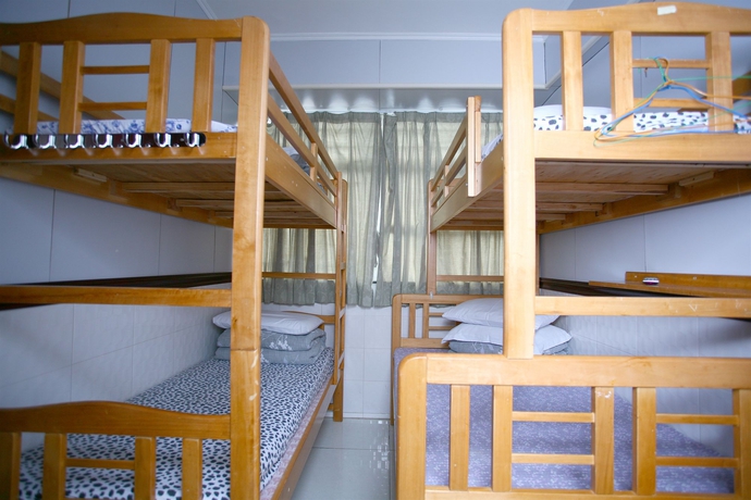 Imagen de la habitación del Hostel H.k Commercial Inn. Foto 9