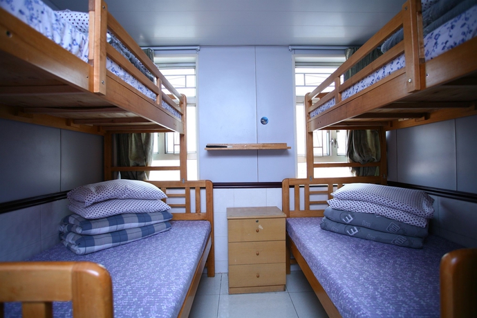 Imagen de la habitación del Hostel H.k Commercial Inn. Foto 11